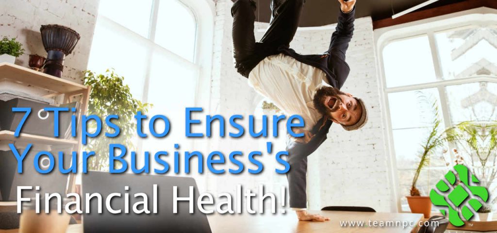 Excited Businessman break-dancing on desk, one-hand on desk