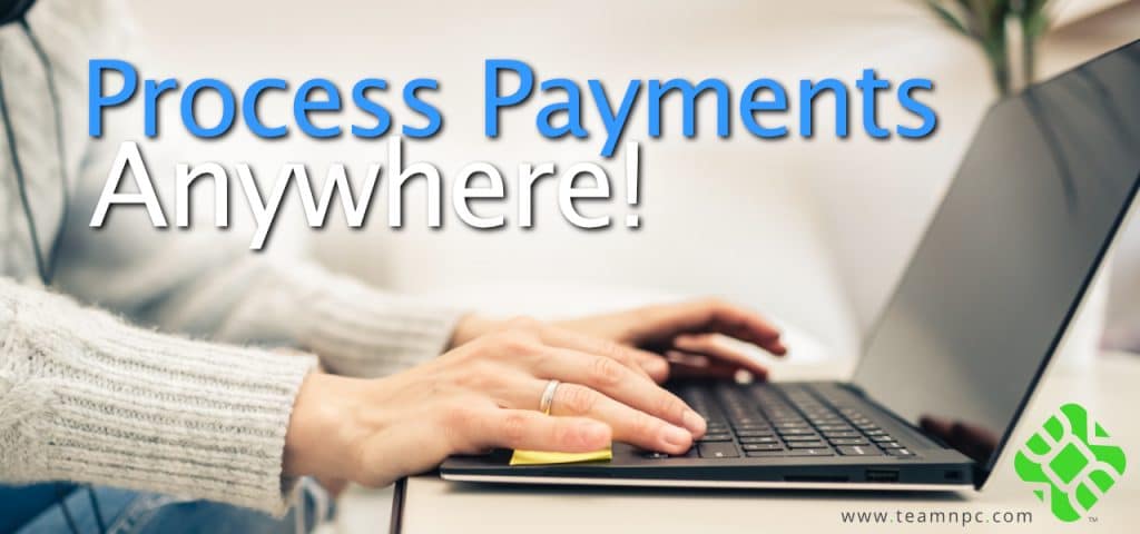 woman working from home typing on laptop Process Payments Anywhere